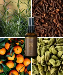 Spray Czterech Alchemików Hebda w otoczeniu rozmarynu, goździków, mandarynek i kardamonu, podkreślający korzenny aromat.