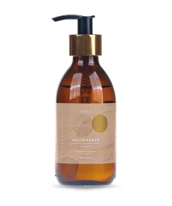 Naturalna Aromabaza do masażu Klaudyna HEBDA w brązowej butelce z pompką, idealna jako aromaterapeutyczna baza zapachowa.