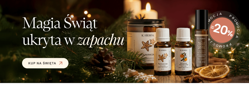 Świąteczny banner reklamowy promujący zestaw produktów, w tym olejki eteryczne i świece, z hasłem "Magia Świąt ukryta w zapachu" i informacją o zniżce do -20%.